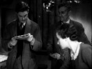 The 39 Steps (1935)Peggy Ashcroft, Robert Donat and newspaper